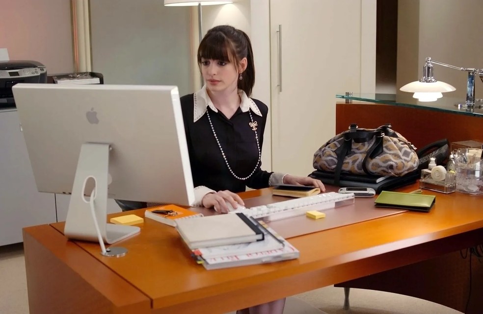 Anne Hathaway deu vida à Andrea ("Andy") Sachs, — Foto: Divulgação