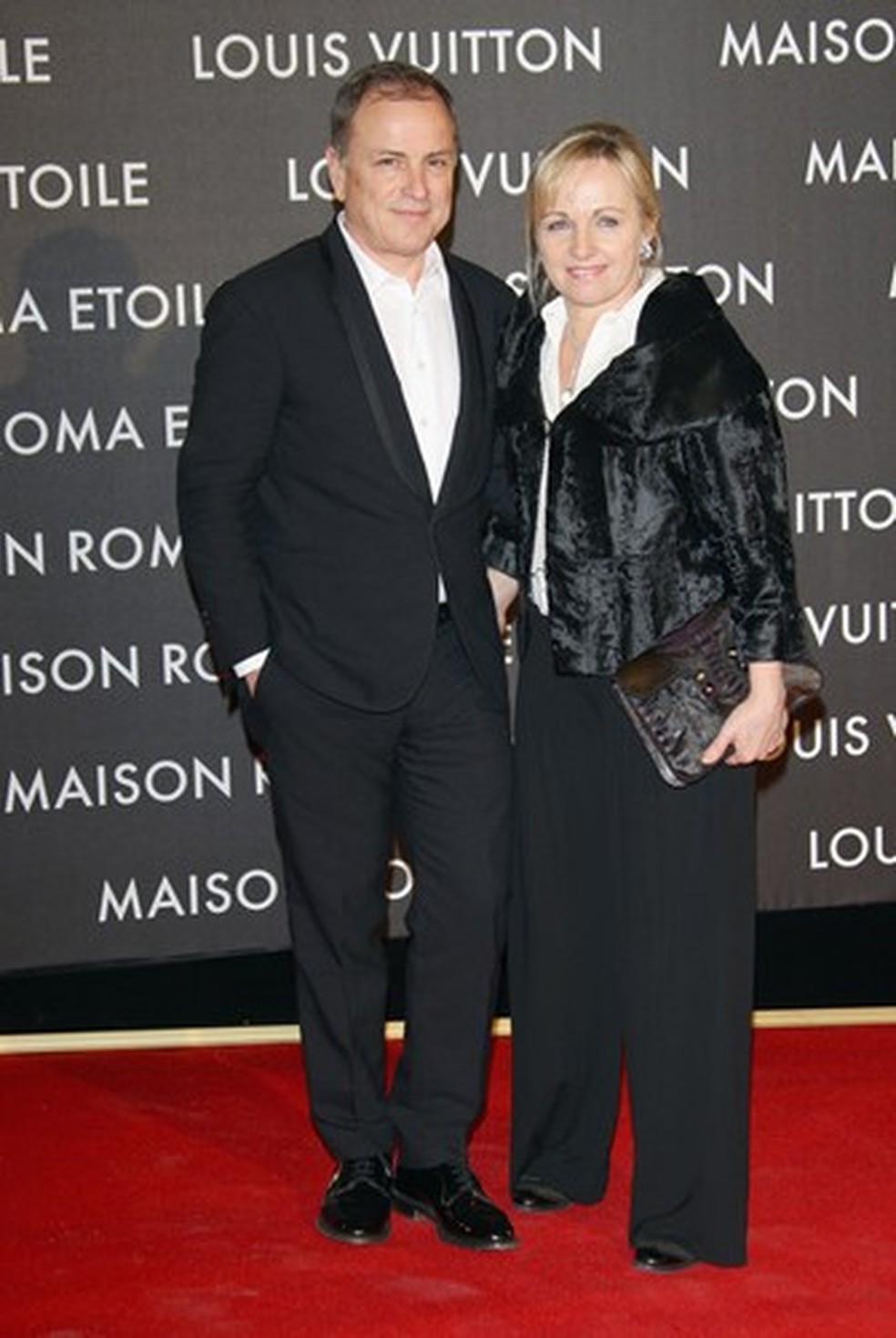 CEO of Louis Vuitton Michael Burke and his wife Brigitte Burke